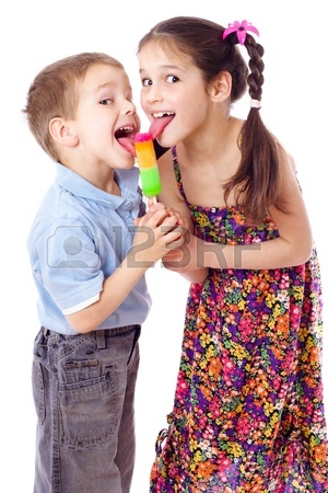 13708688-girl-and-boy-licking-ice-cream-together-isolated-on-white